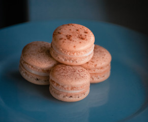 Cool Background of Warm Cinnamon french macrons