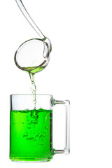 Glass mug and ladle with tarragon drink