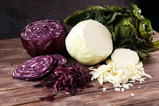Three fresh organic cabbage heads. Antioxidant balanced diet eating with fresh red cabbage, white cabbage and savoy