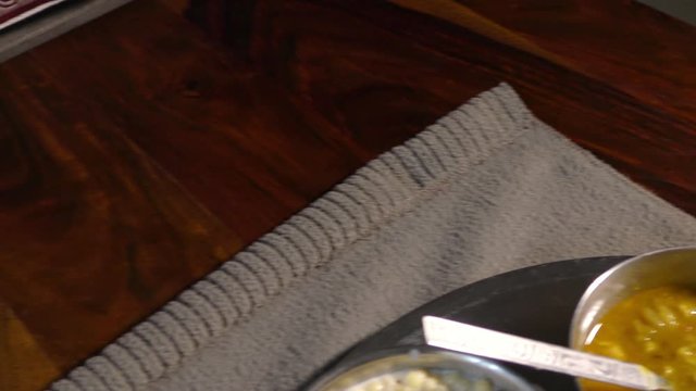 A plate of chole bhature served on the table