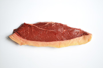 Slice of beef tenderloin isolated on a white background