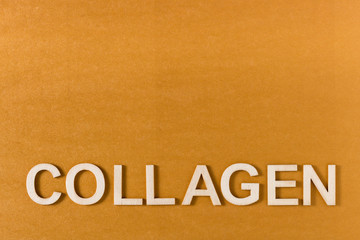 Collagen word written with wooden letters, top view