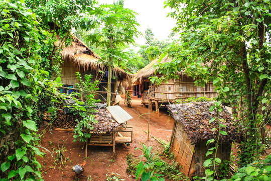 huts made of bamboo and straw in a rainforest, jungle in a village Northern Thailand