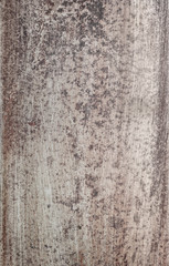Steel textured metal sheet background with rust with traces of sanding sandpaper. Vertical orientation