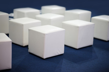 Modern seat , white cube shape of seat in exhibition room or living room