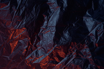 abstract dark texture of crumpled plastic film for Wallpaper and backgrounds