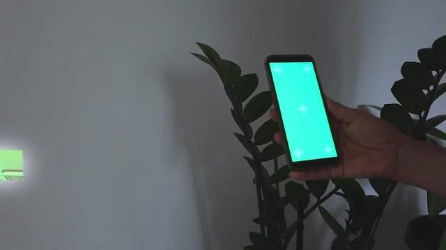 Futuristic video call, with hologram effect and on the screen woman with anti-covid mask. Future of communications