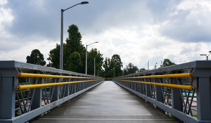 metal pedestrian bridge in city
