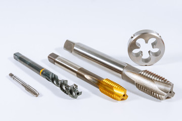 Tap for threading in metal. Tool for metal processing.