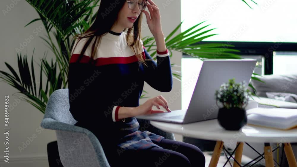 Poster asian young woman working remotely on development of internet website at laptop device with using wi