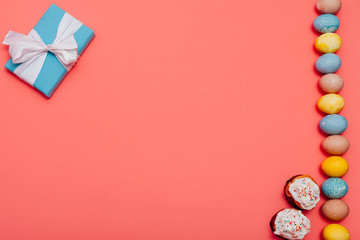 multi-colored eggs on the feast Easter background for inscriptions