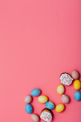 multi-colored eggs on the feast Easter background for inscriptions