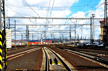 Cross rail track on the ground and hundards wires in the air
