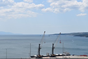 Naklejka na ściany i meble Cranes at port an empty port
