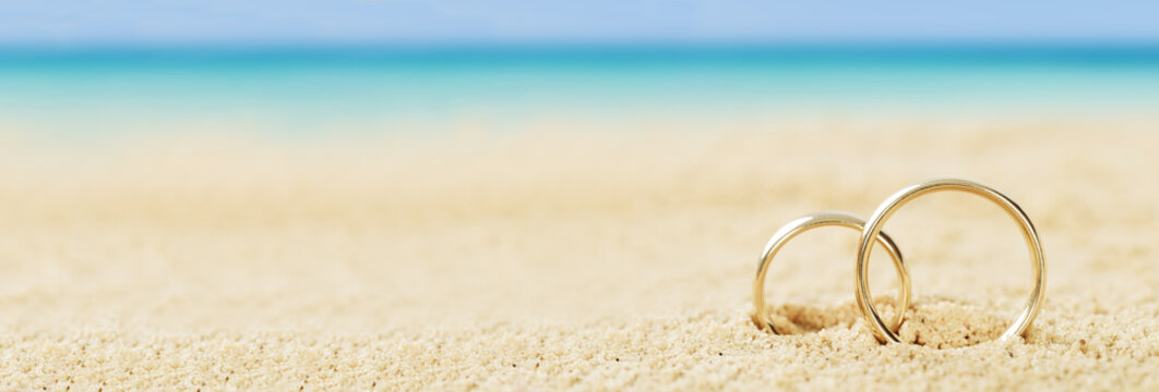 Wedding Rings On Sand