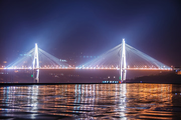 Fototapeta na wymiar Full Badong bridge at night over Yangtze River in Xinling, China.