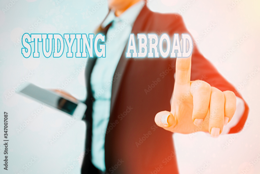 Poster writing note showing studying abroad. business concept for learn outside of home in foreign country 