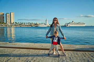 mom and son by the sea