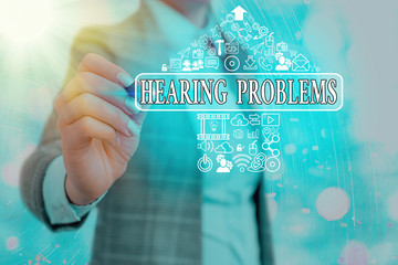 Writing note showing Hearing Problems. Business concept for is partial or total inability tolisten...
