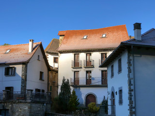 Uztarroz, a beautiful and tiny village of Valle de Roncal, the Navarrese Pyrenees, Foral Community of Navarre (Spain). The traditional architecture of the Pyrenees.