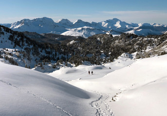 Fototapeta na wymiar Arlas peak in the Larra Belagua valley, the highest and widest part of the Roncal valley, the Navarrese pyrenees, Navarra. Winter and snow at nordic ski station Larra-Belagua, near France border.