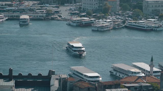 ISTANBUL, TURKEY, AUGUST 21, 2014: The boat is moored in the bay of golden horn. 4k video. Golden horn bay in turkey is a frequently used waterway by ferries.