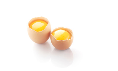 Broken egg isolated on white background