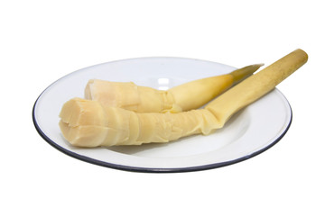 Bamboo shoots on a plate, isolated on white background with clipping path