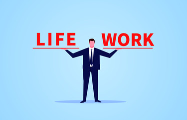 Businessman hand holding letters LIFE and WORK to balance