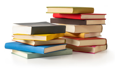 テーブルの上に積み重ねられた本　読書、勉強のイメージ素材
