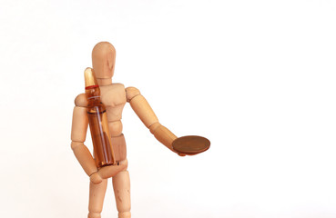 Wood figurine trading vaccine for euro money