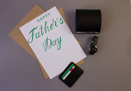holiday greeting card for father's day with text on a gray background, brutal