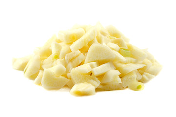 Pile of chopped garlic isolated on a white background. Finely chopped garlic on a white background. Sliced garlic cloves on a white background. Chopped garlic isolated on a white background.