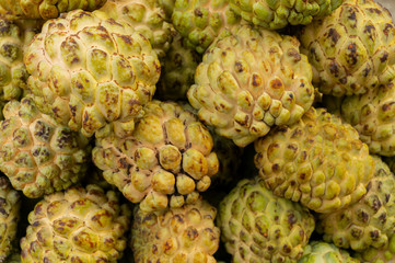 Custard apple fruits, Annona reticulata, are on display for sale at New Market area, Kolkata, West Bengal, India.
