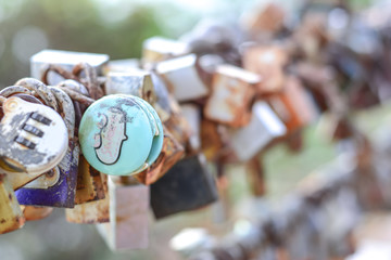 Tha Mai, Chanthaburi, Thailand, 7 September 2019, Padlocks show symbol of a couples everlasting love, forever and togetherness, Hang the keys on the suspension cable to show confidence in love