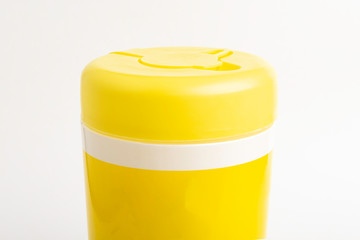 Closed Yellow Top Cap Of A Disinfectant Wipes Container