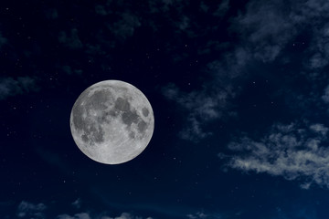 Obraz na płótnie Canvas Beautiful full moon in the night sky.