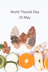 Fresh nutritious ingredients in shape of thyroid. Healthy food as source vitamins. World Thyroid Day and problems with thyroid concept