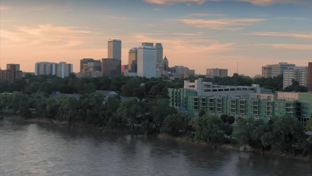 Tulsa, Oklahoma, USA. Aerial city skyline & suburbs over the Arkansas River.