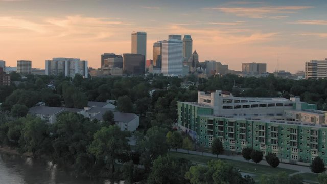 Tulsa, Oklahoma, USA. Aerial city skyline & suburbs over the Arkansas River.