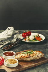 Fried chicken fillet and boiled vegetables
