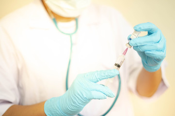 Syringe medical injection in hand holding with medicine dose vaccination equipment with needle.