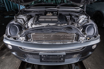 Fototapeta premium Car engine close-up. Internal combustion engine, car parts, deteyling. Parsing jankyard.