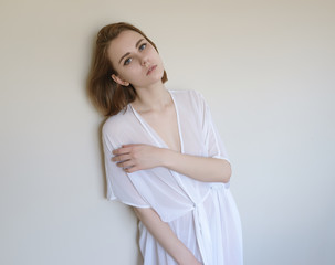 Portrait of a beautiful young woman with blue eyes.