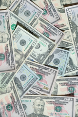 Background with money american hundred dollar bills.Finance and business concept. Stock market report, financial graph.American paper dollar bills as part of the global financial and trading system