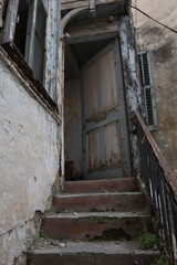 Old abandoned damaged and deserted house staircase