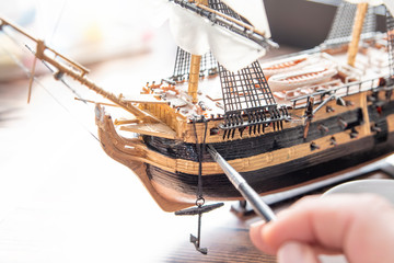 Model Ship Building handcraft on table with different materials