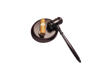 Judge gavel and cigar isolated on white background. Tobacco law