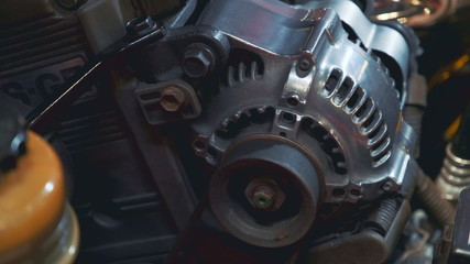 Close-up of retro car electric generator. Detail view