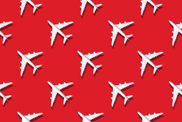 Summer pattern. Creative banner of white planes on bright background. Travel, vacation concept. Travel, vacation ban. Flights cancelled and resumed again. Top view. Flat lay. Minimal style design.